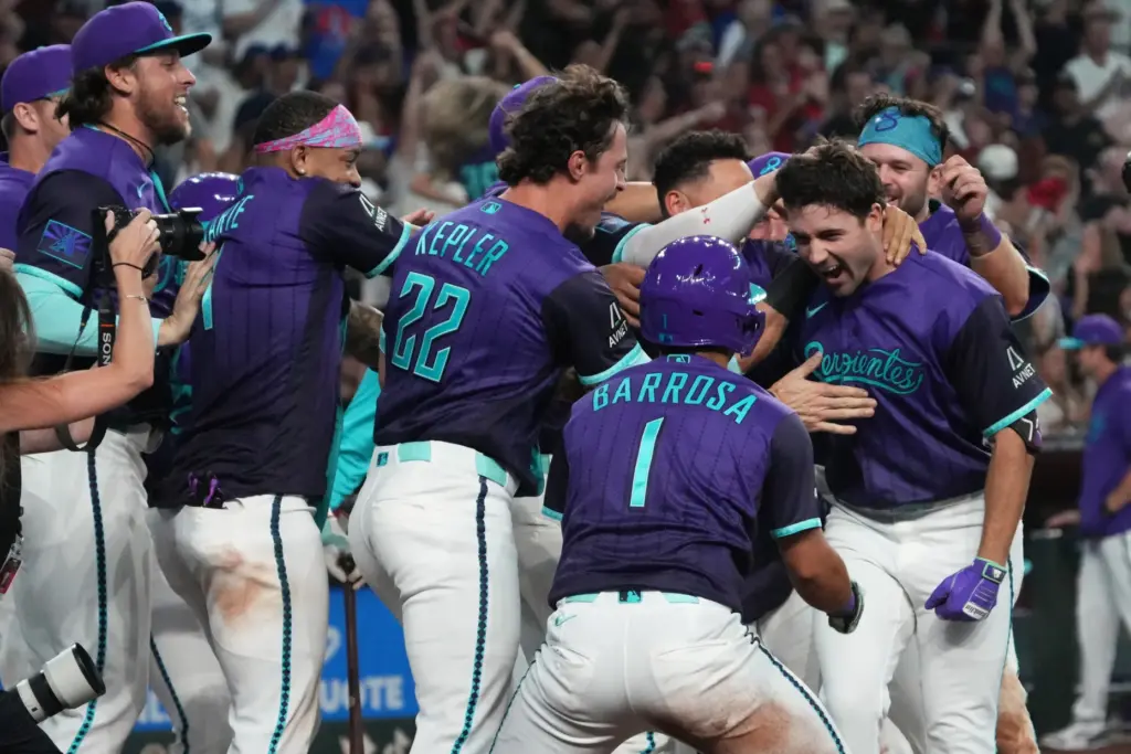 The Arizona Diamondbacks’ Ryan Waldschmidt, right, celebrates with teammates at...