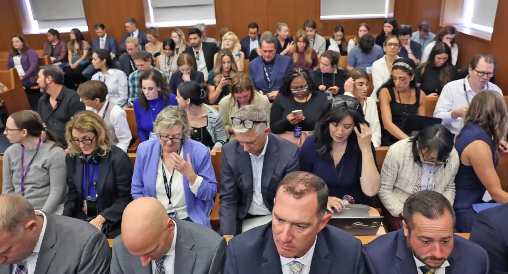 A packed courtroom gallery listens during closing arguments in the Lindsay Clancy murder trial.