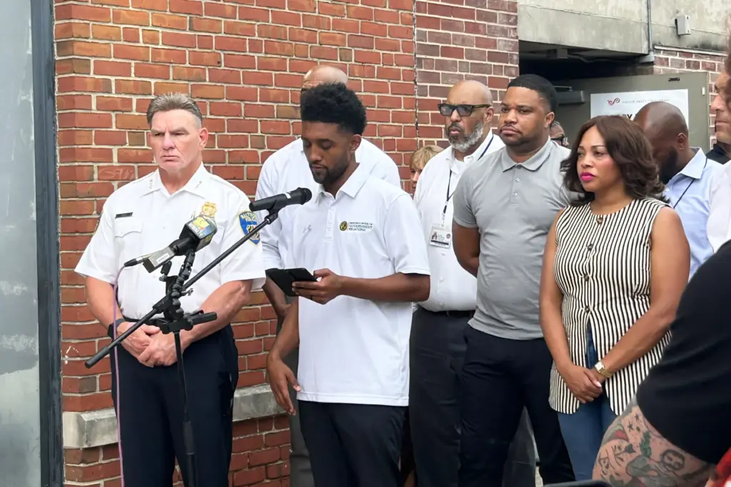 Baltimore Mayor Brandon Scott is joined by other city officials after a mass overdose incident.