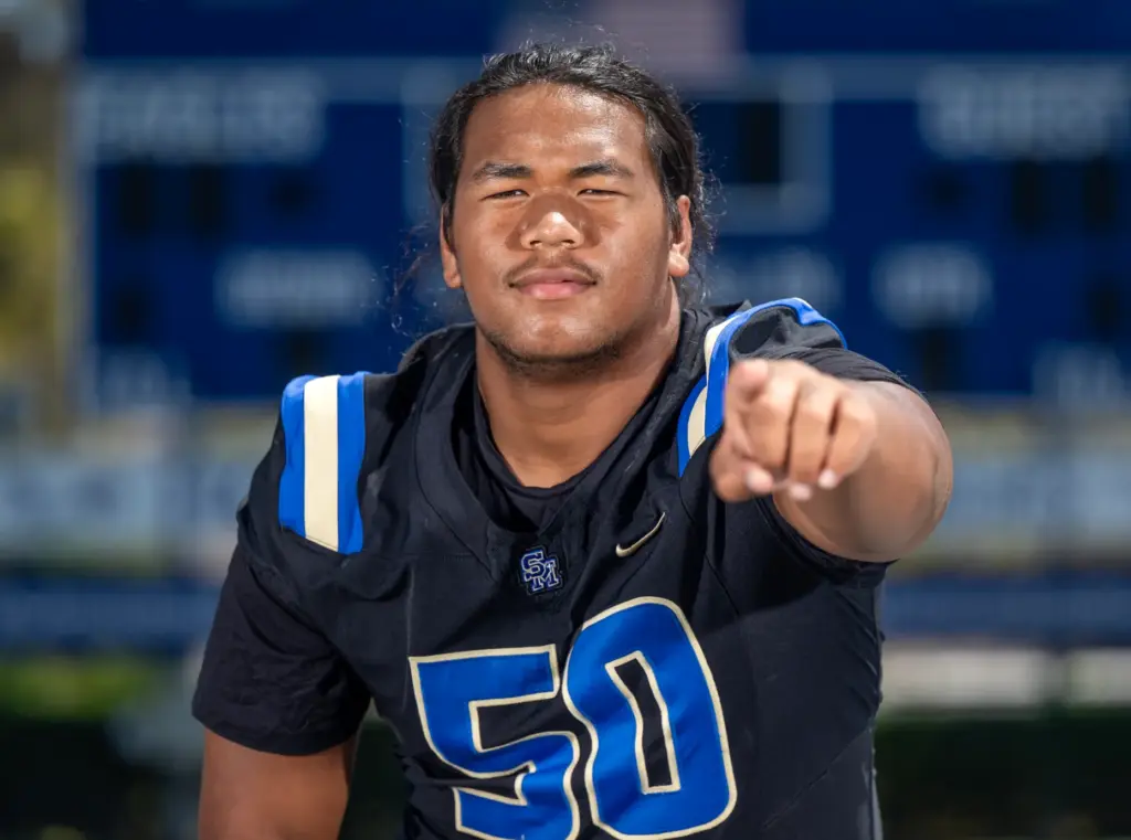 Adam Iloilo (#50), left tackle at Santa Margarita Catholic High...