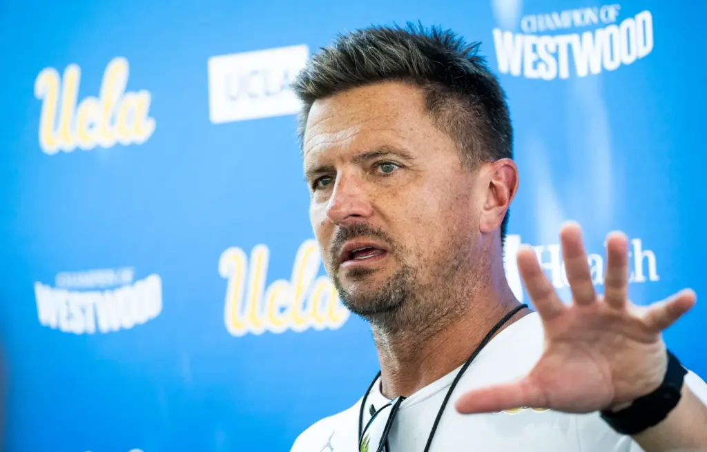 UCLA head coach Bob Chesney talks to the media following...