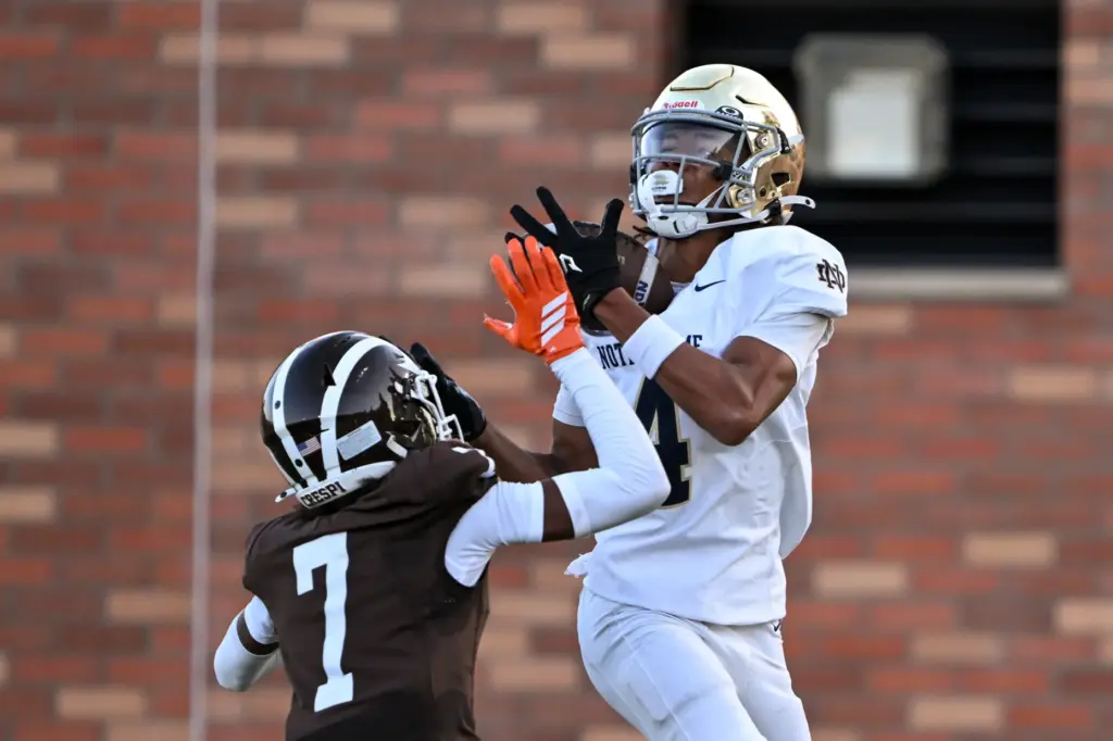 Notre Dame’s Mica Weaver (4) pulled in this pass for...