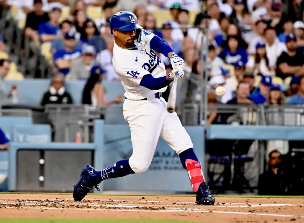 The Dodgers’ Mookie Betts hits a solo home run during...