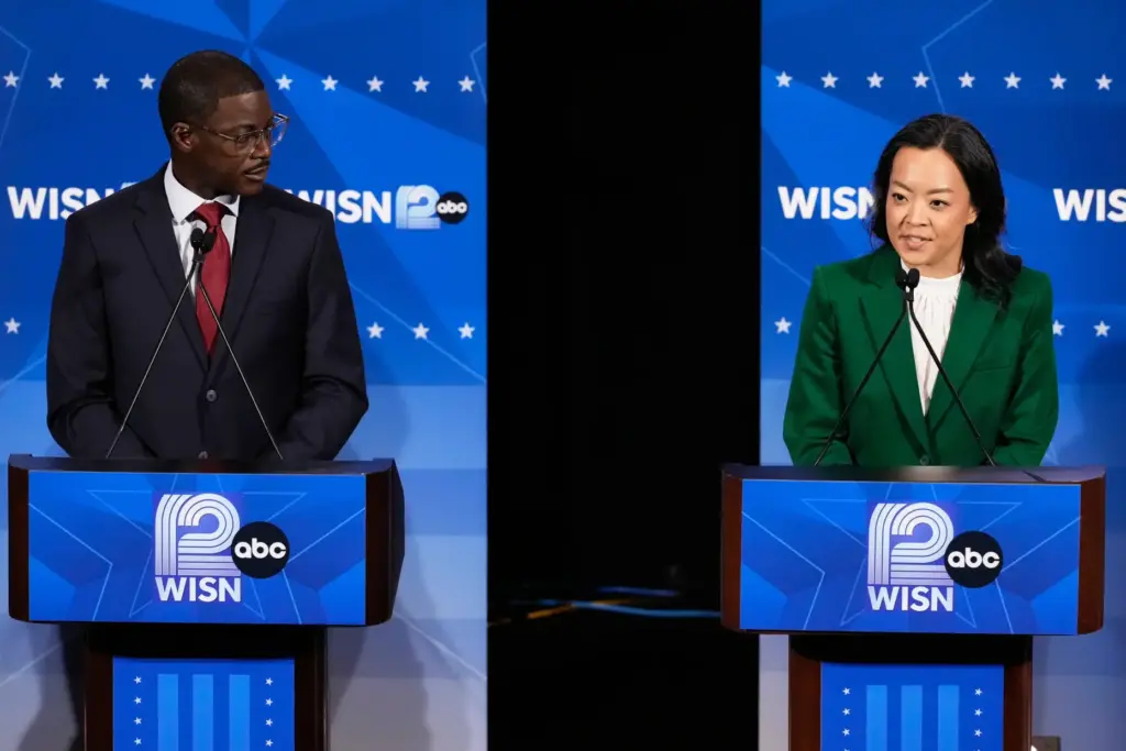 Democratic gubernatorial candidate Francesca Hong, right, talks as David Crowley...