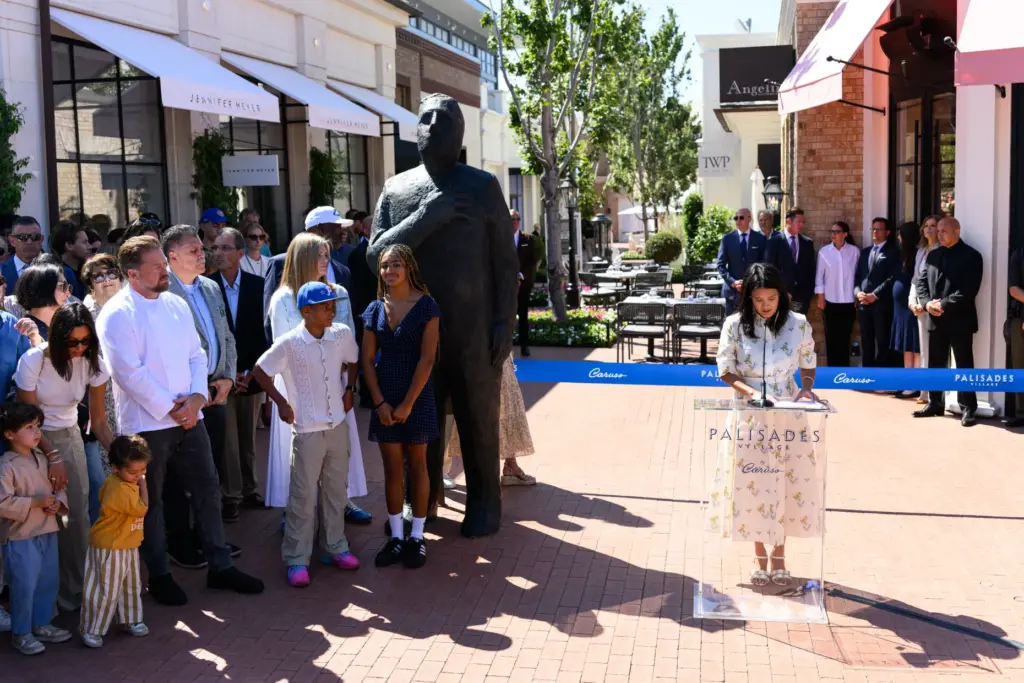 Caruso CEO Corinne Verdery speaks at the grand reopening of...