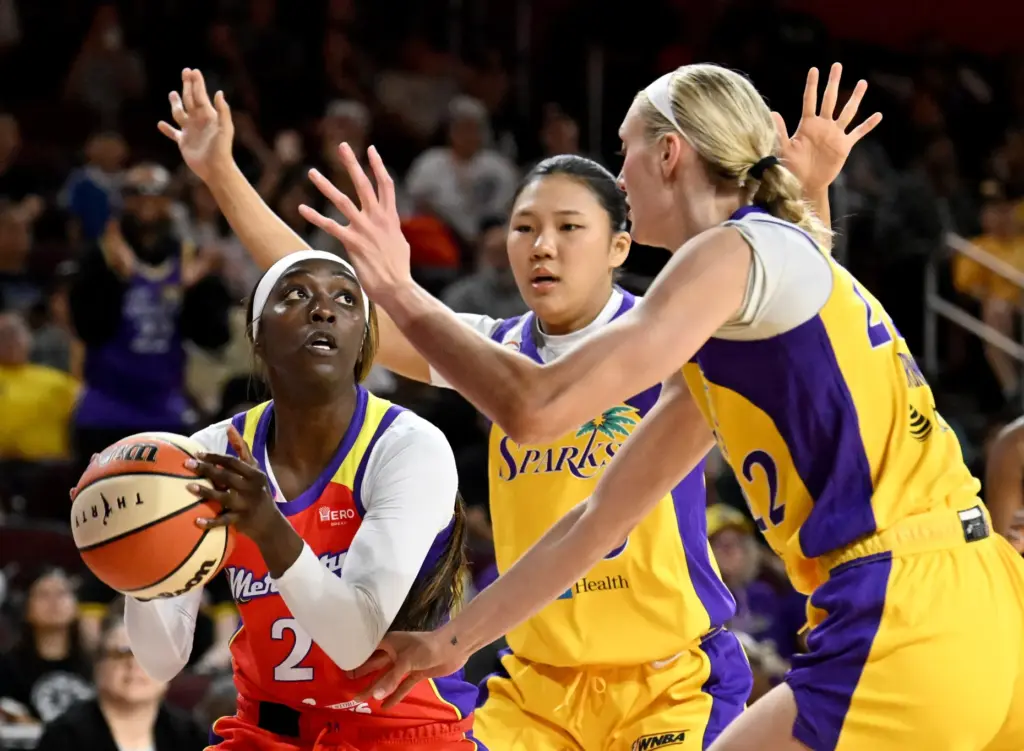 Phoenix Mercury guard-forward Kahleah Copper (2) looks to take a...