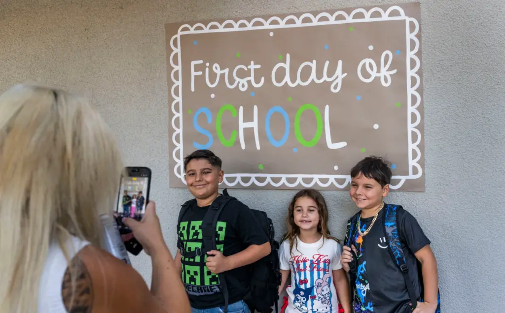 Lynkon Garcia, Alaina Rawlin and Lyden Garcia, from left, have...