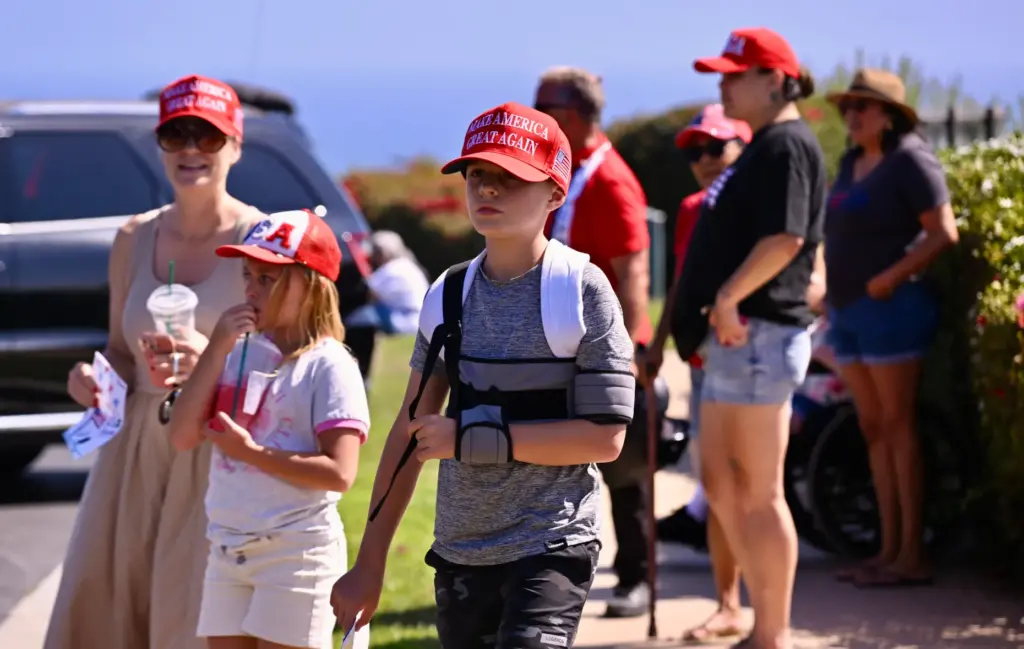 Trump supporters in front of Trump National Golf Club in...