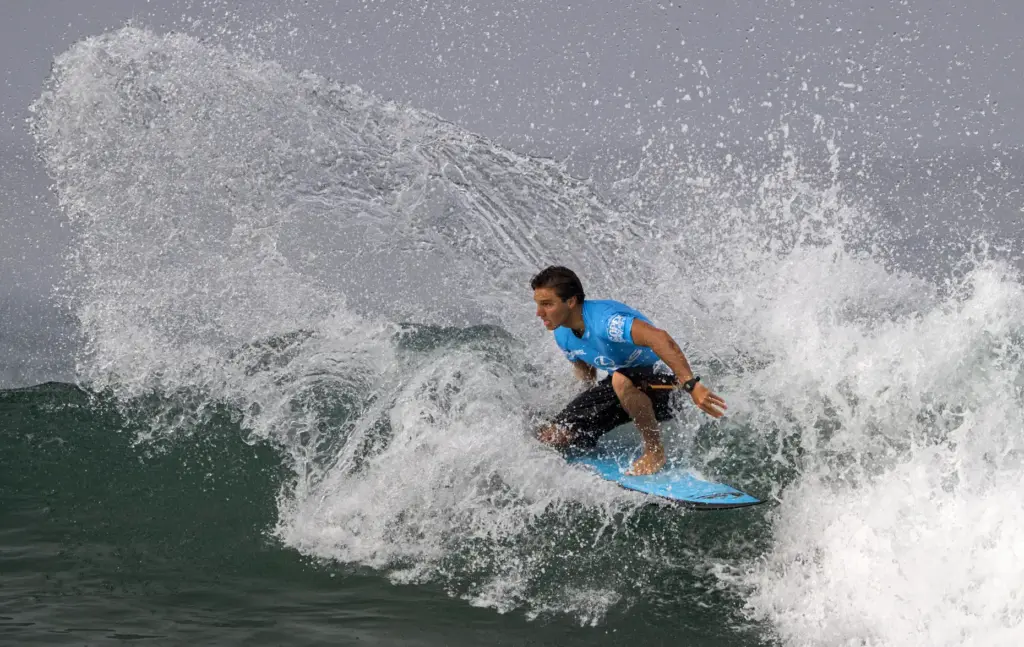 Gavriel Klaussner competes in the U.S. Open of Surfing quarterfinals...