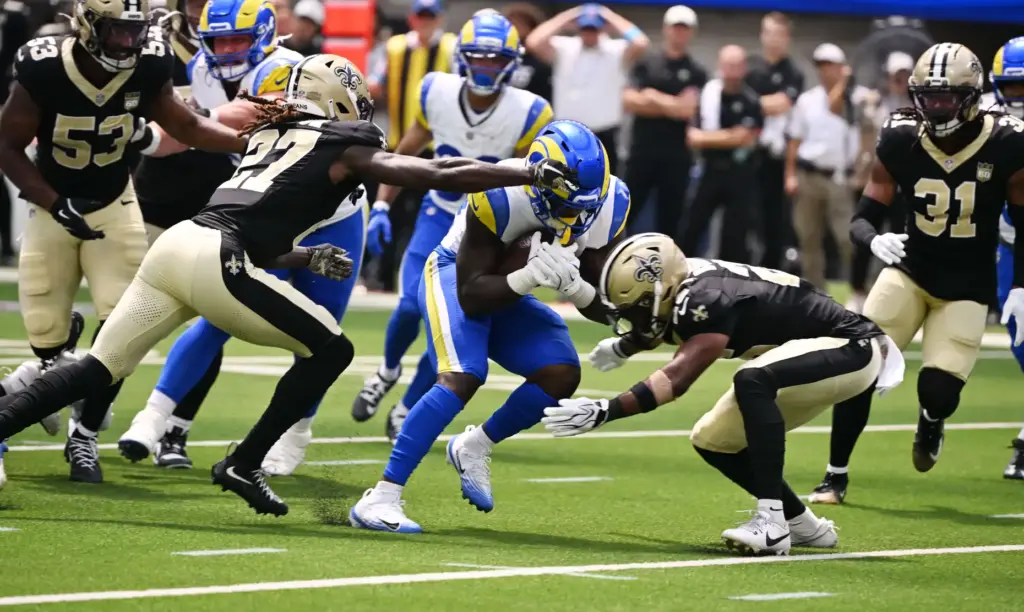 Rams running back Jordan Waters (32) runs for a first...