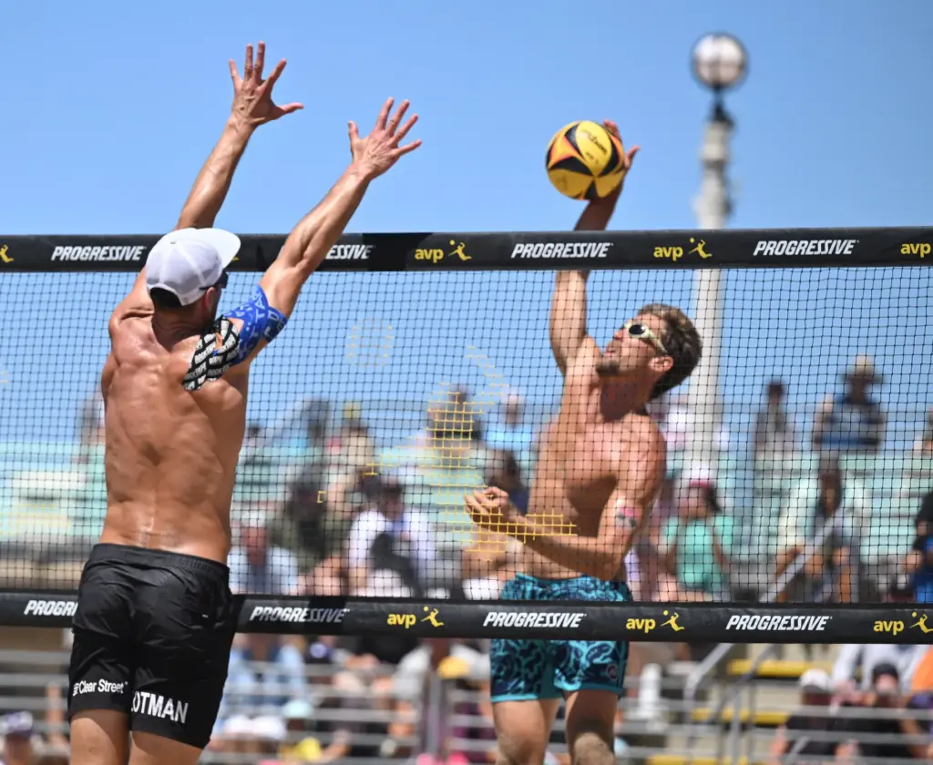 Miles Partain and Paul Lotman play against Taylor Crabb and...