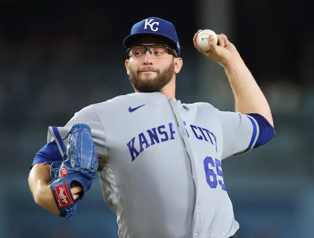 Kansas City Royals starting pitcher Noah Cameron throws to the...