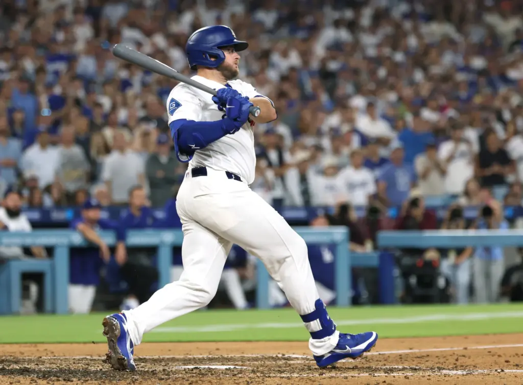 The Dodgers’ Max Muncy hits a three-run double to give...