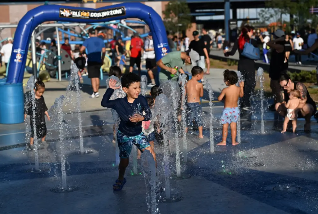 Children chill out at the cooling zone during the Ontario...