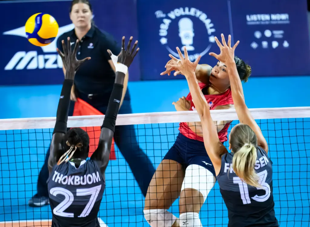 Team USAâs Avery Skinner gets the ball past Canada defenders...