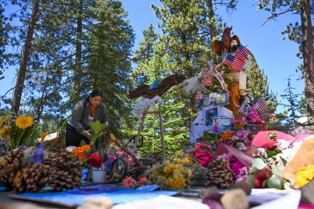 Alexandria Lara, with Little Green Florist, delivers flowers to the...