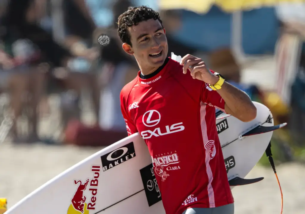 Griffin Colapinto of San Clemente smiles at fans after advancing...