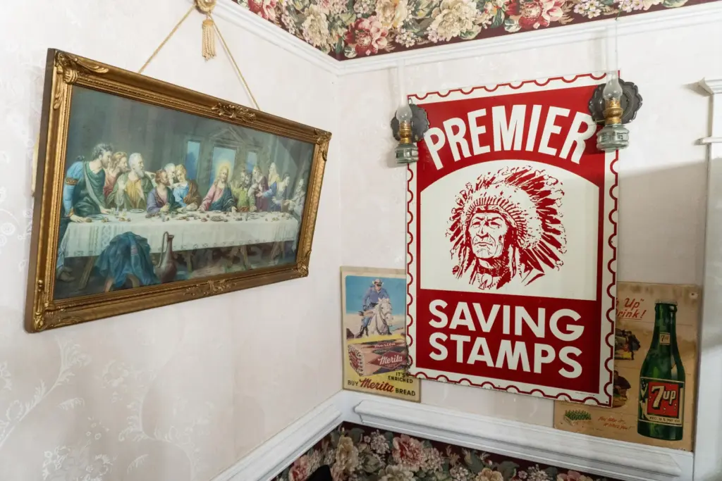 Antiques hang on Angie Loweryâs walls at her home.