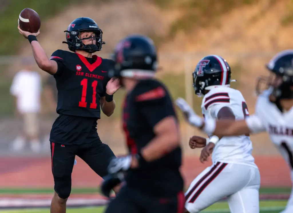San Clemente quarterback Preston Beck (11) throws the ball during...
