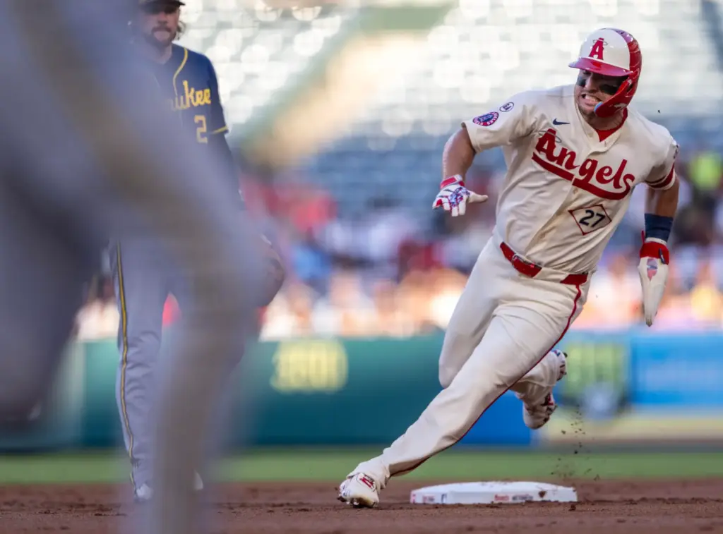 Angels center fielder Mike Trout (27) rounds second base on...