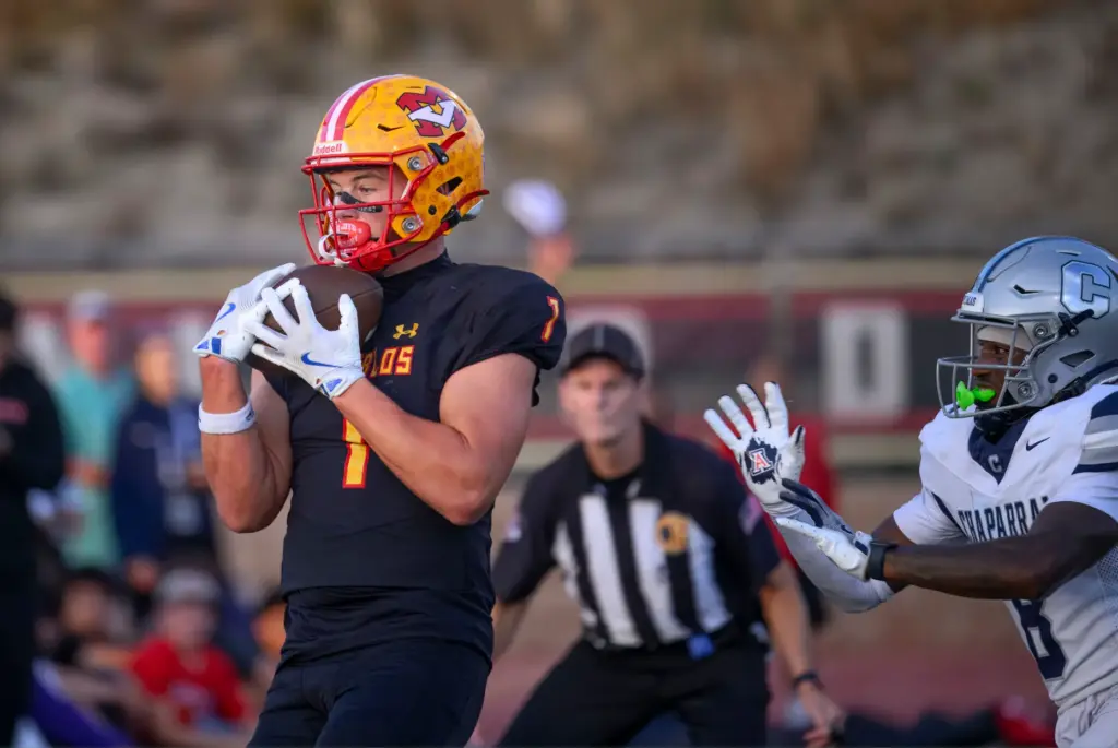 Mission Viejo wide receiver Luke Karby, left, beats Chaparral cornerback...