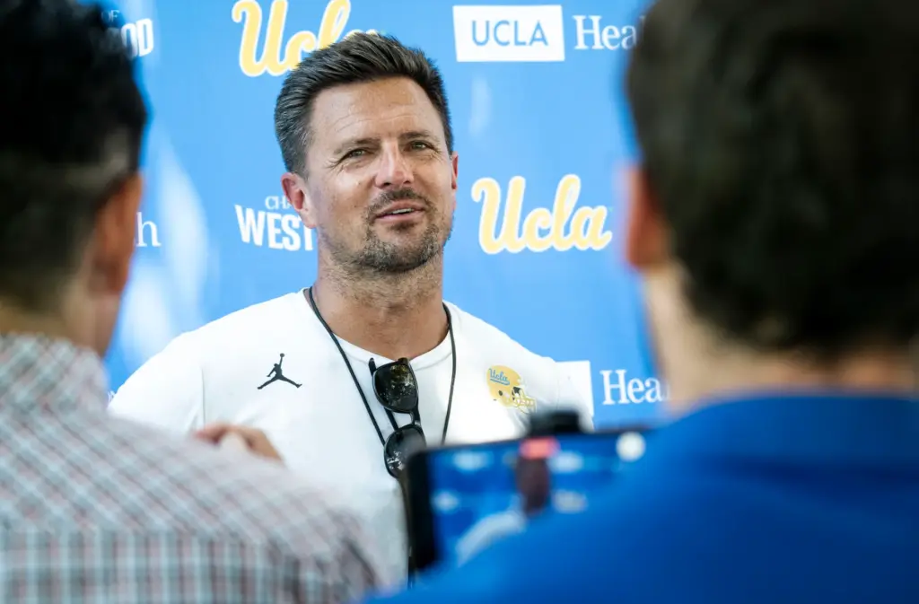 UCLA head coach Bob Chesney talks to the media following...