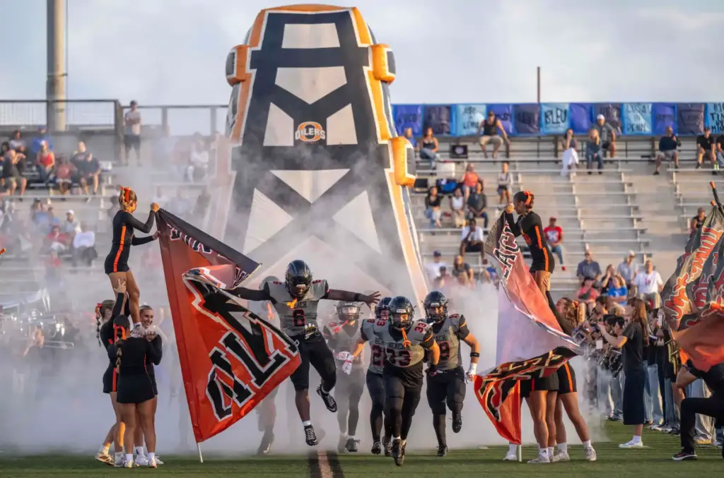 The Oilers take the field for a nonleague home game...
