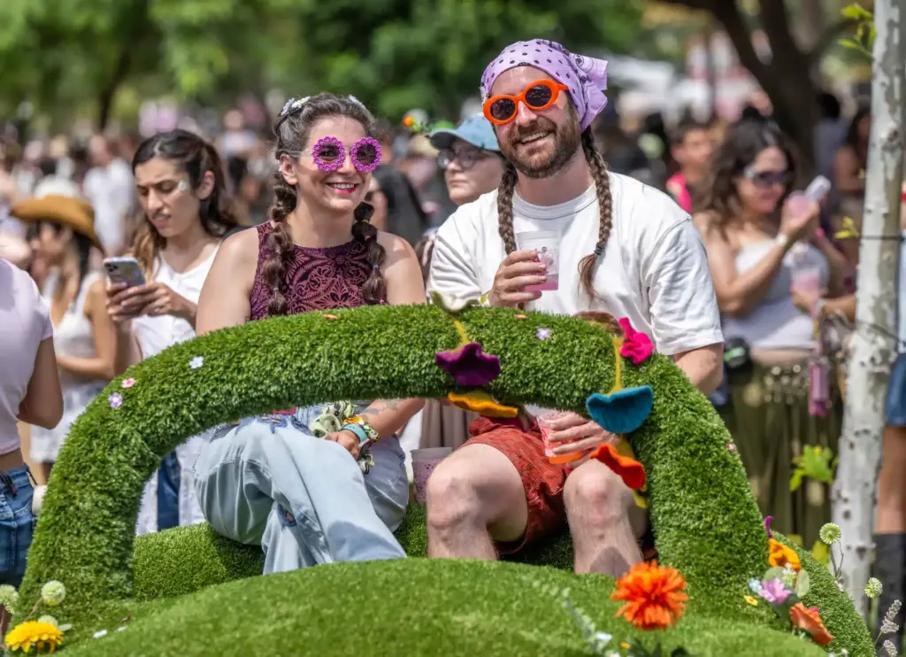 Laura Nichols and Jason Plumke of Seattle sit together in...
