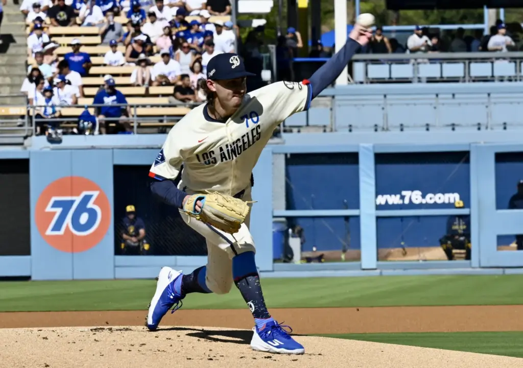 Justin Wrobleski of the Dodgers throws to the plate against...