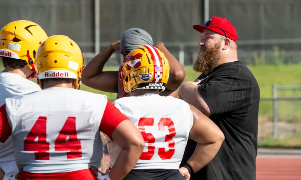 Mission Viejo High School offensive line coach Sam Baker talks...