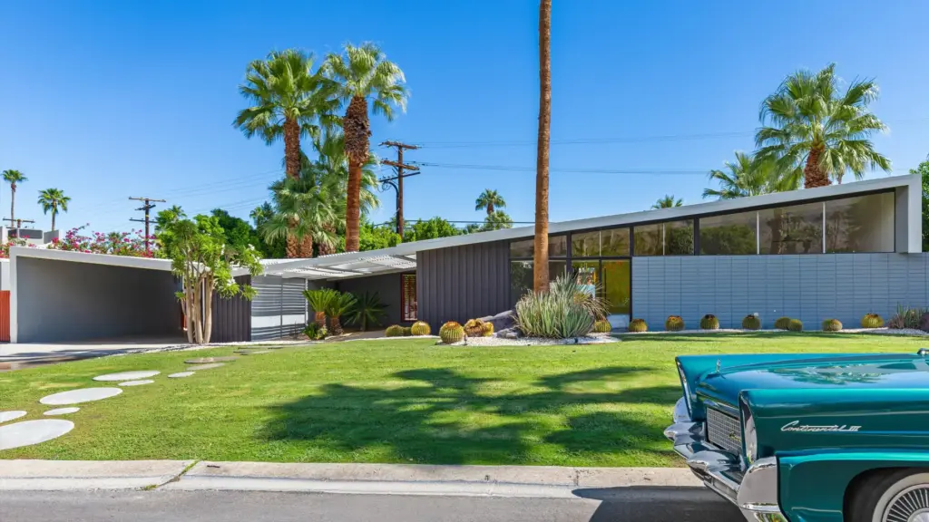 Designed by modernist architect William Krisel, this Palm Springs butterfly-roof...