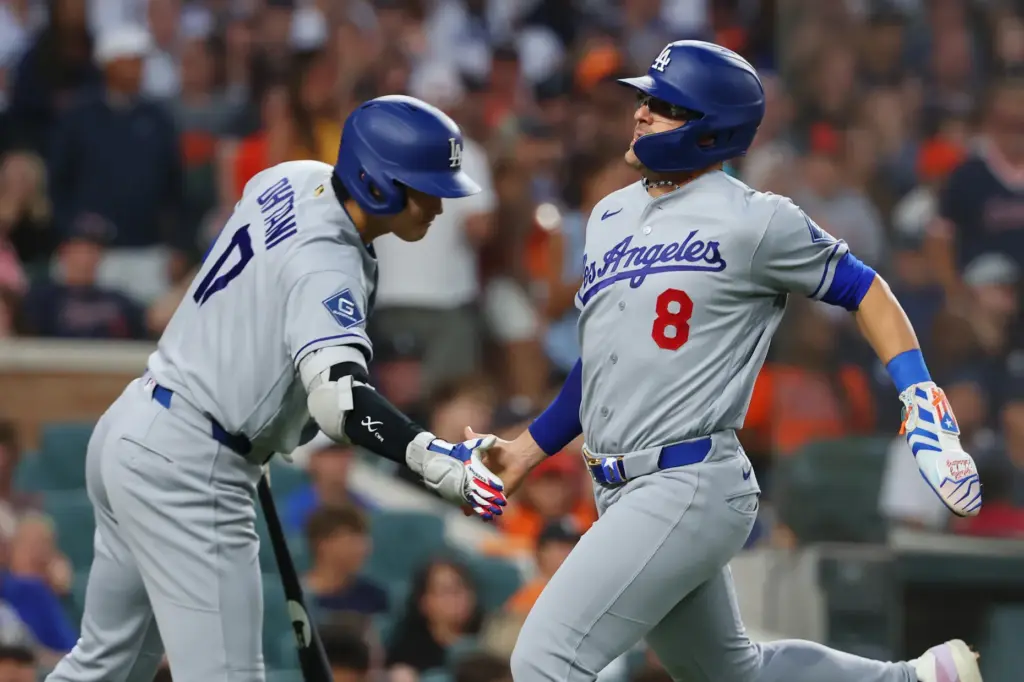 The Dodgers’ Kike HernÃ¡ndez, right, celebrates with teammate Shohei Ohtani...