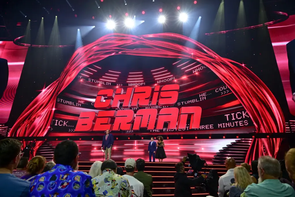 Chris Berman with Steve Young on stage at the D23...