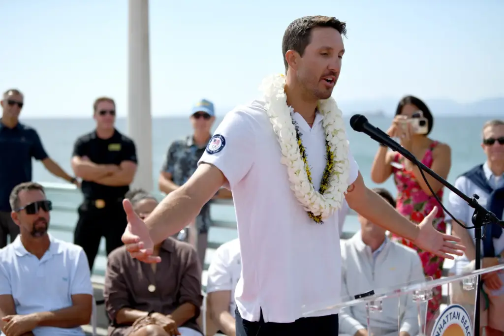 Miles Evans speaks during the annual Manhattan Beach Open Walk...