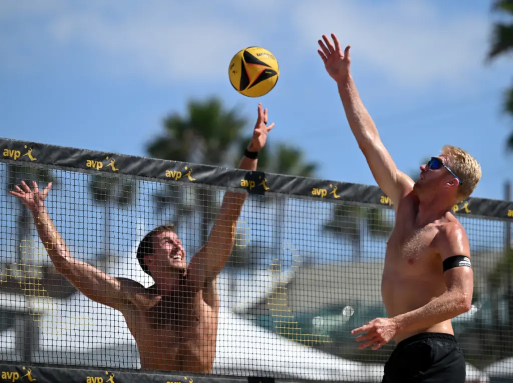 Trevor Crabb and Chase Budinger play against Timothy Brewster and...