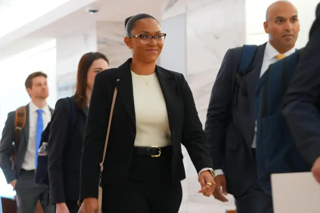 McKenna West, left, arrivers with her legal team for a...