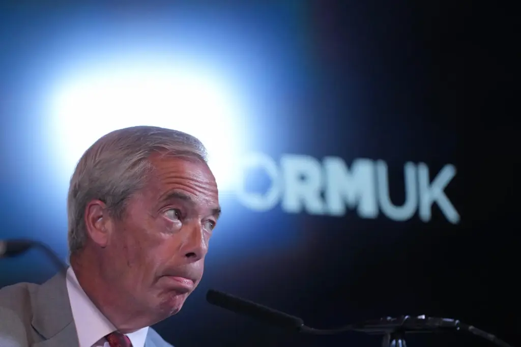 Nigel Farage, leader of Britain's Reform UK party, speaks during a news conference.