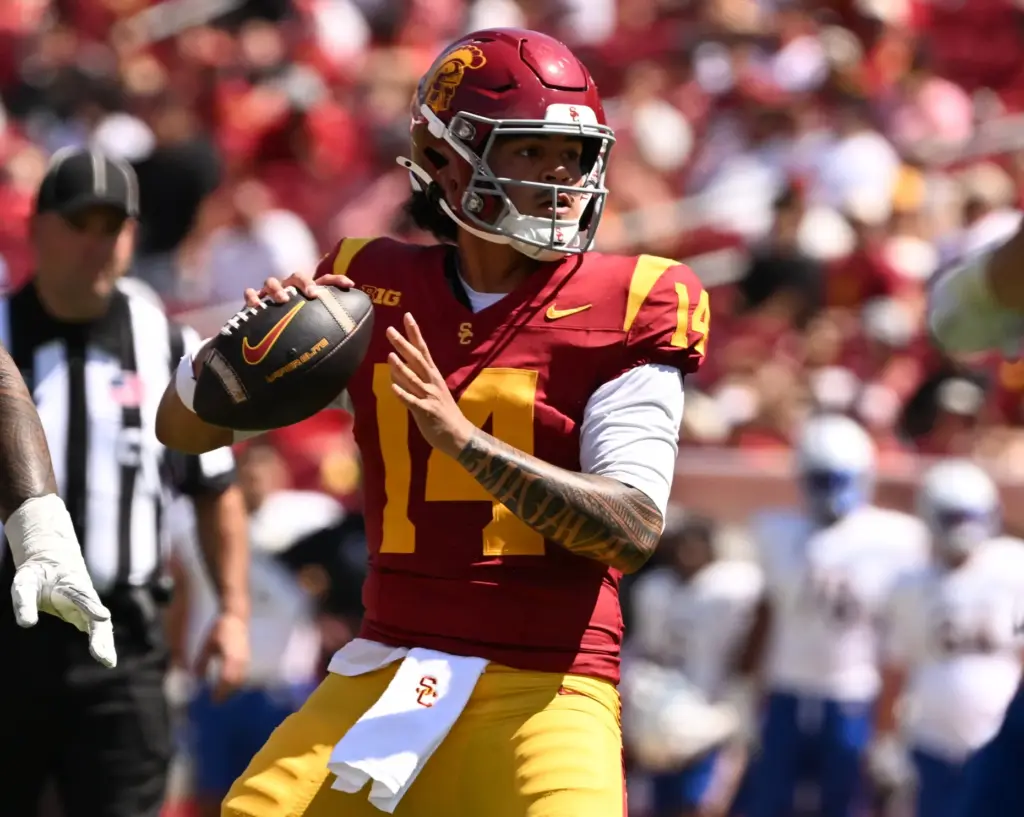 Quarterback Jayden Maiava (14) of the USC Trojans prepares to...