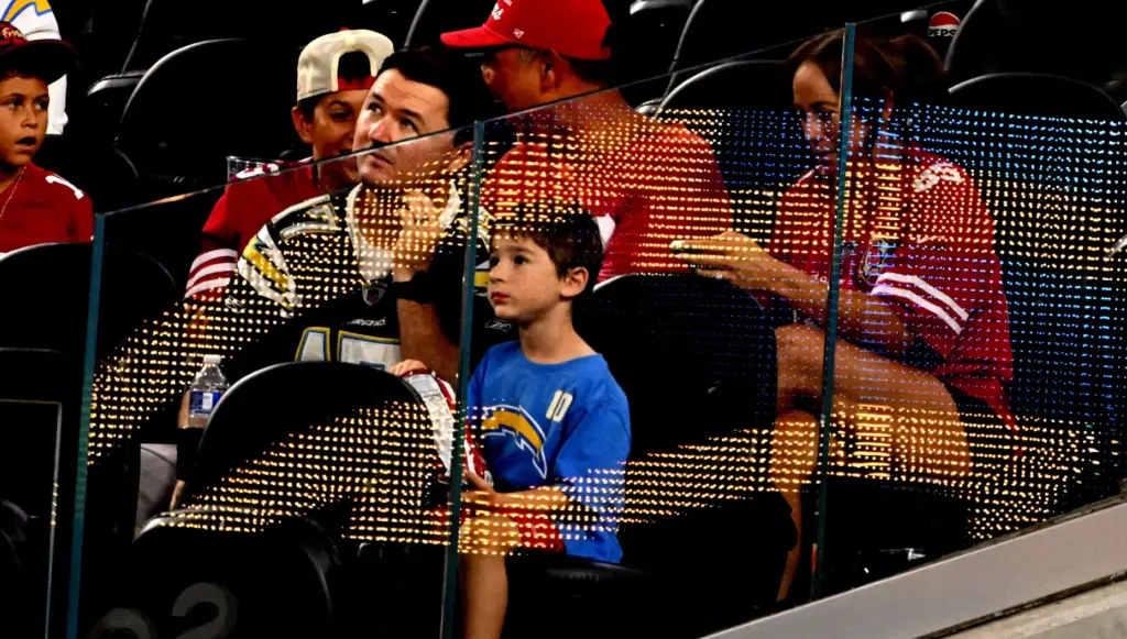 A young Chargers fan looks on during the first half...
