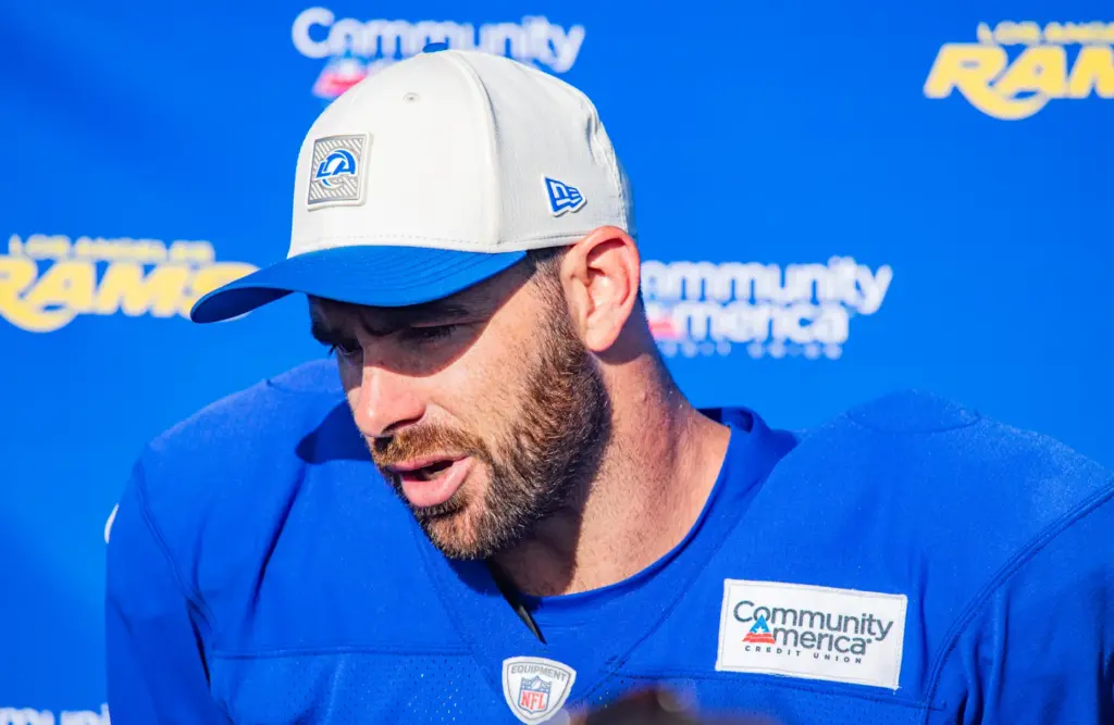 Rams tight end Tyler Higbee speaks to the media following...
