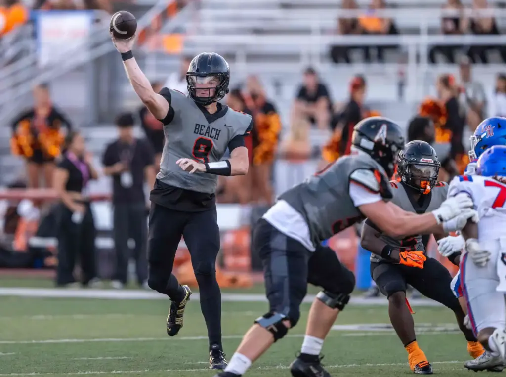 Huntington Beach quarterback Brady Edmunds (9) throws the ball during...