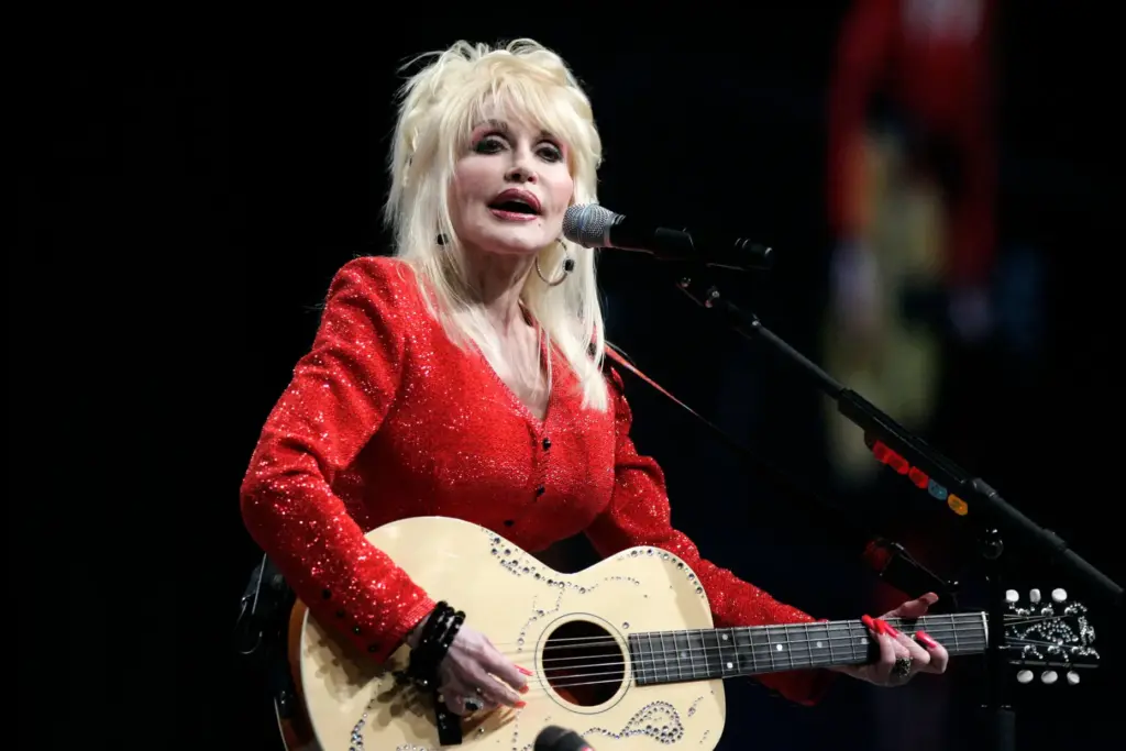 FILE – Dolly Parton performs at a United Way of...