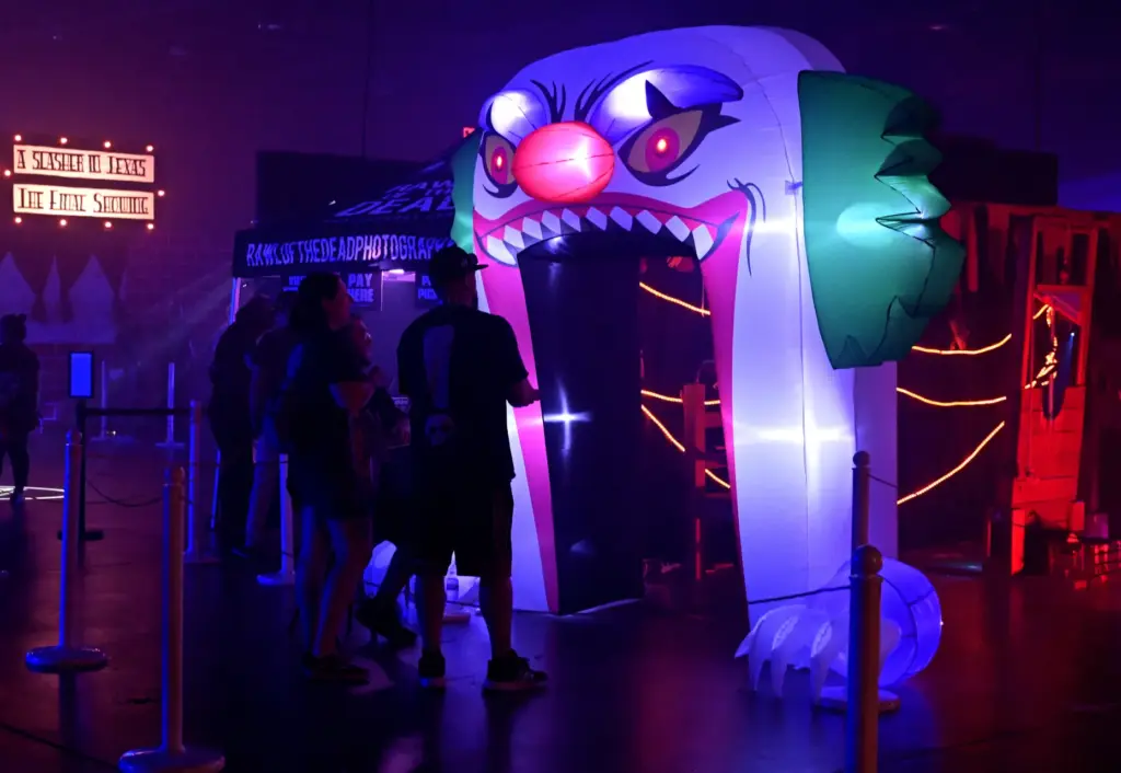 Fans wait to tour one of the many booths during...