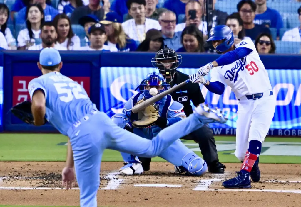 The Dodgers’ Mookie Betts hits a solo home run during...