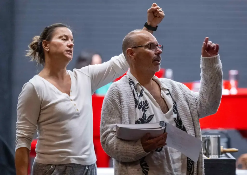 Damien Lorton, right, co-founder of One More Productions, directs actors...