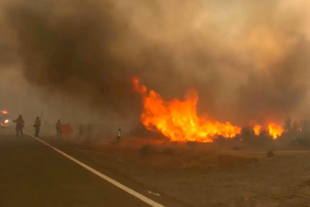 This image taken from video shows active wildfires Saturday, Aug....