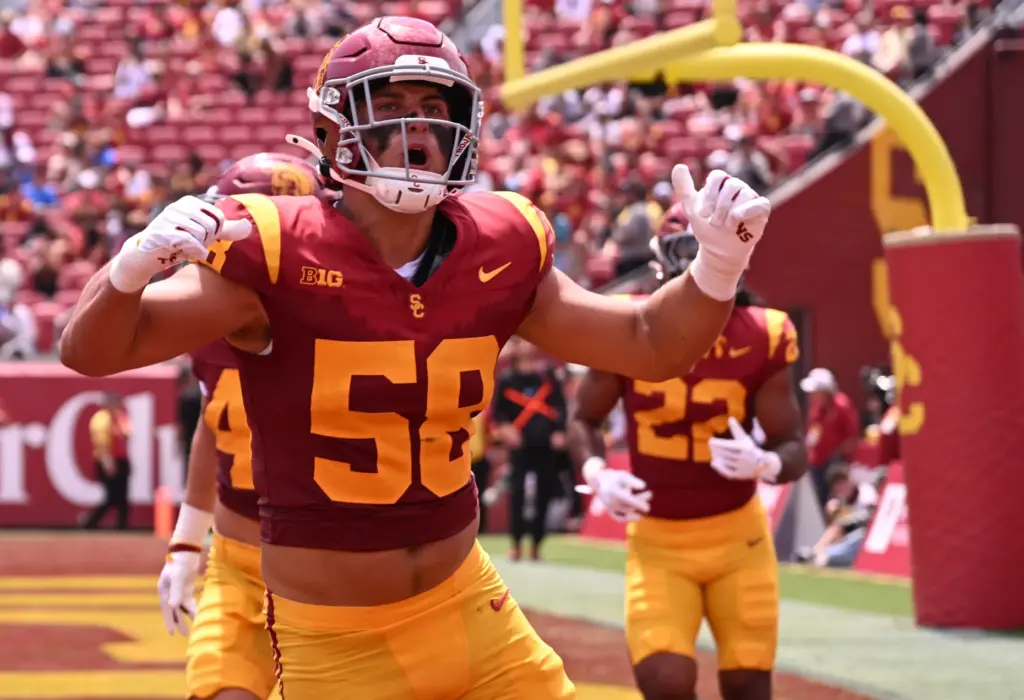 Linebacker Giancarlo Rufo (58) of the USC Trojans reacts after...