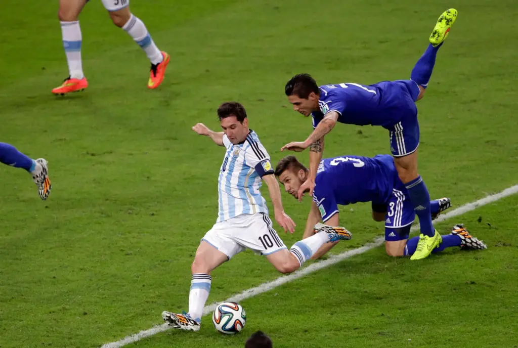 FILE – Argentina’s Lionel Messi scores his team’s second goal...