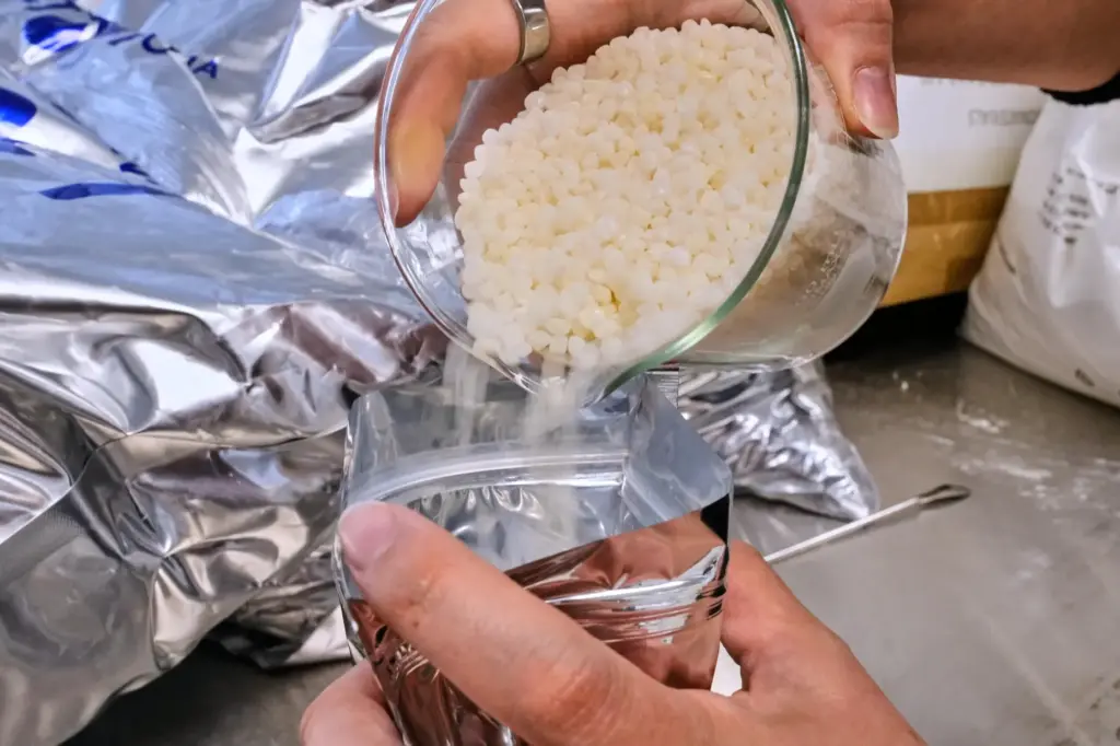 Biopolymer pellets, used in manufacturing a variety of compostable cups...