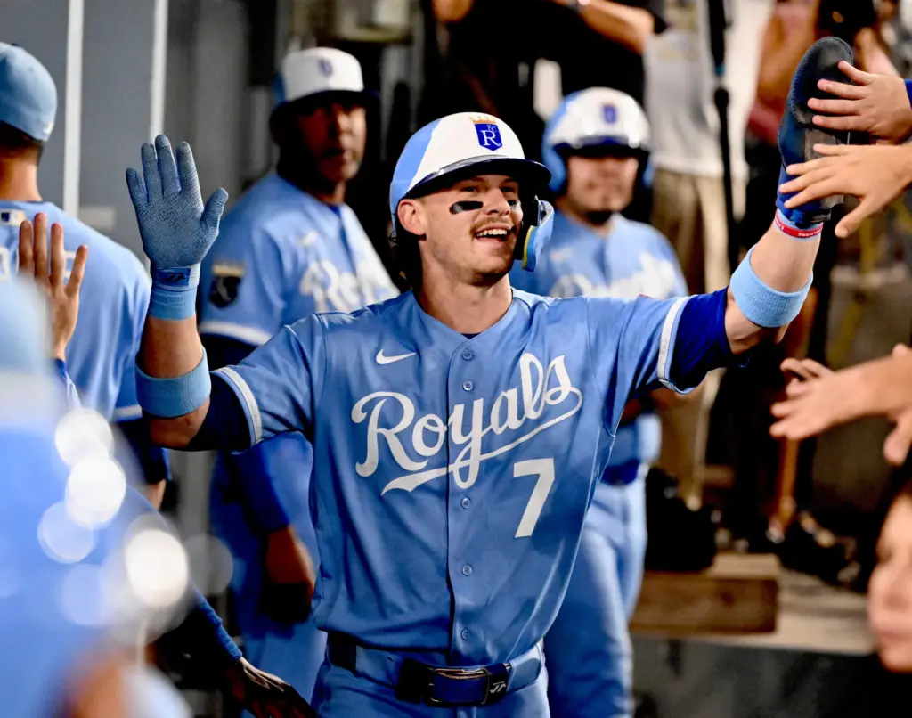 The Kansas City Royals’ Bobby Witt Jr. celebrates with teammates...